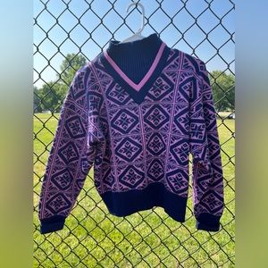 Obermeyer turtleneck vintage pink and navy sweater in size ladies medium.